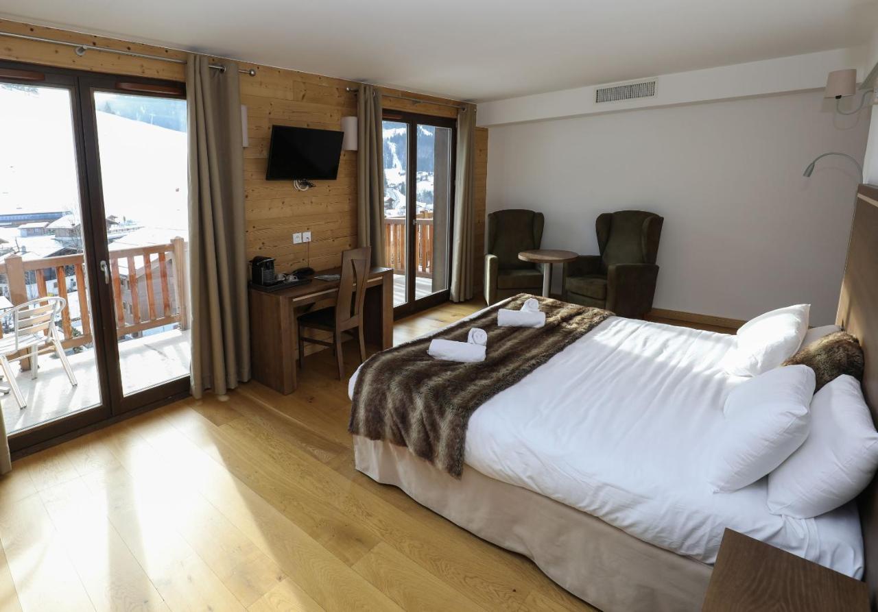Hotel Prestige Odalys Le Chamois La Clusaz Exterior photo